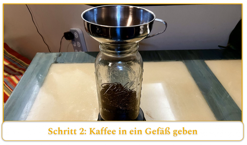 step 2 of making cold brew coffee; transferring coffee grounds into a glass mason jar