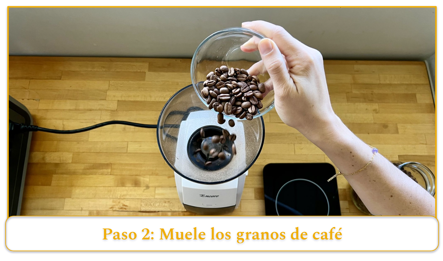 step 2 of using a pour-over coffee maker; grinding coffee beans
