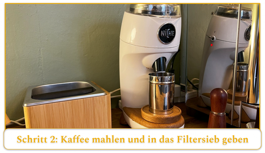 step 2 of using an espresso machine; grind your coffee beans and add the grounds to the basket