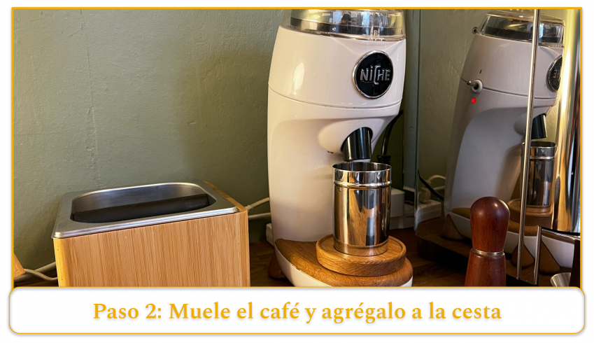 step 2 of using an espresso machine; grind your coffee beans and add the grounds to the basket