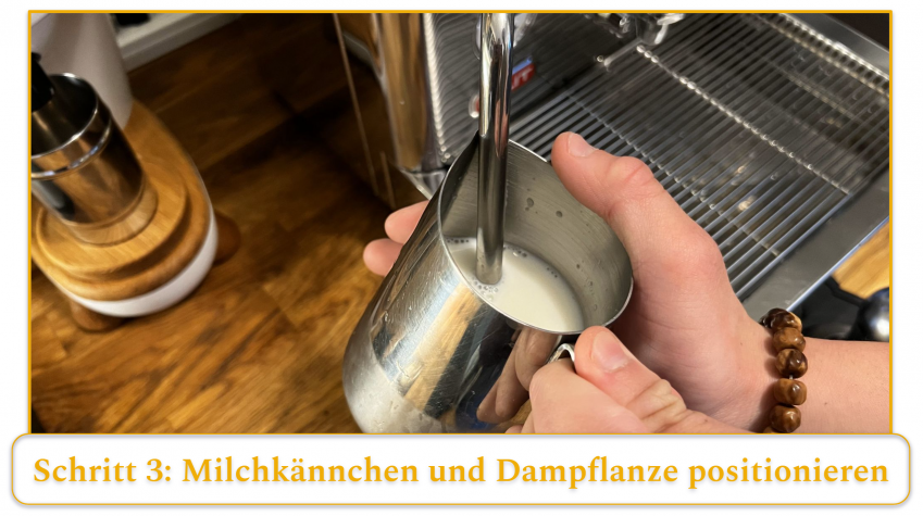 step 3 of using an espresso machine's steam wand; position the tip of the steam wand into the milk