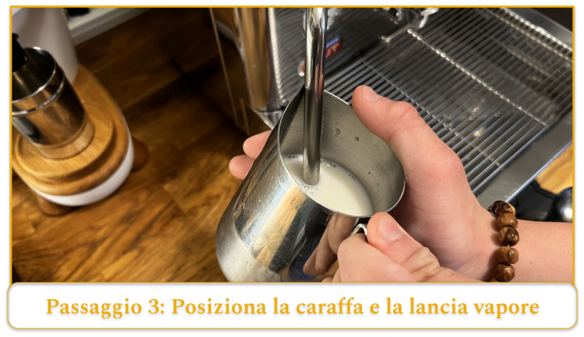 step 3 of using an espresso machine's steam wand; position the tip of the steam wand into the milk